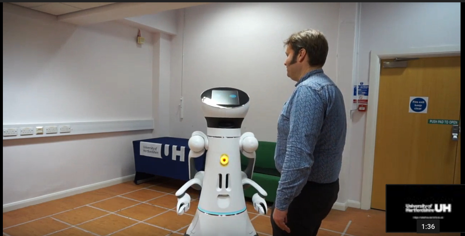 Care-o-bot 4 and I are engaged in a dramatic conversation.